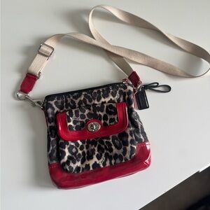 Coach Red and Black Crossbody Bag with Bold Animal Print